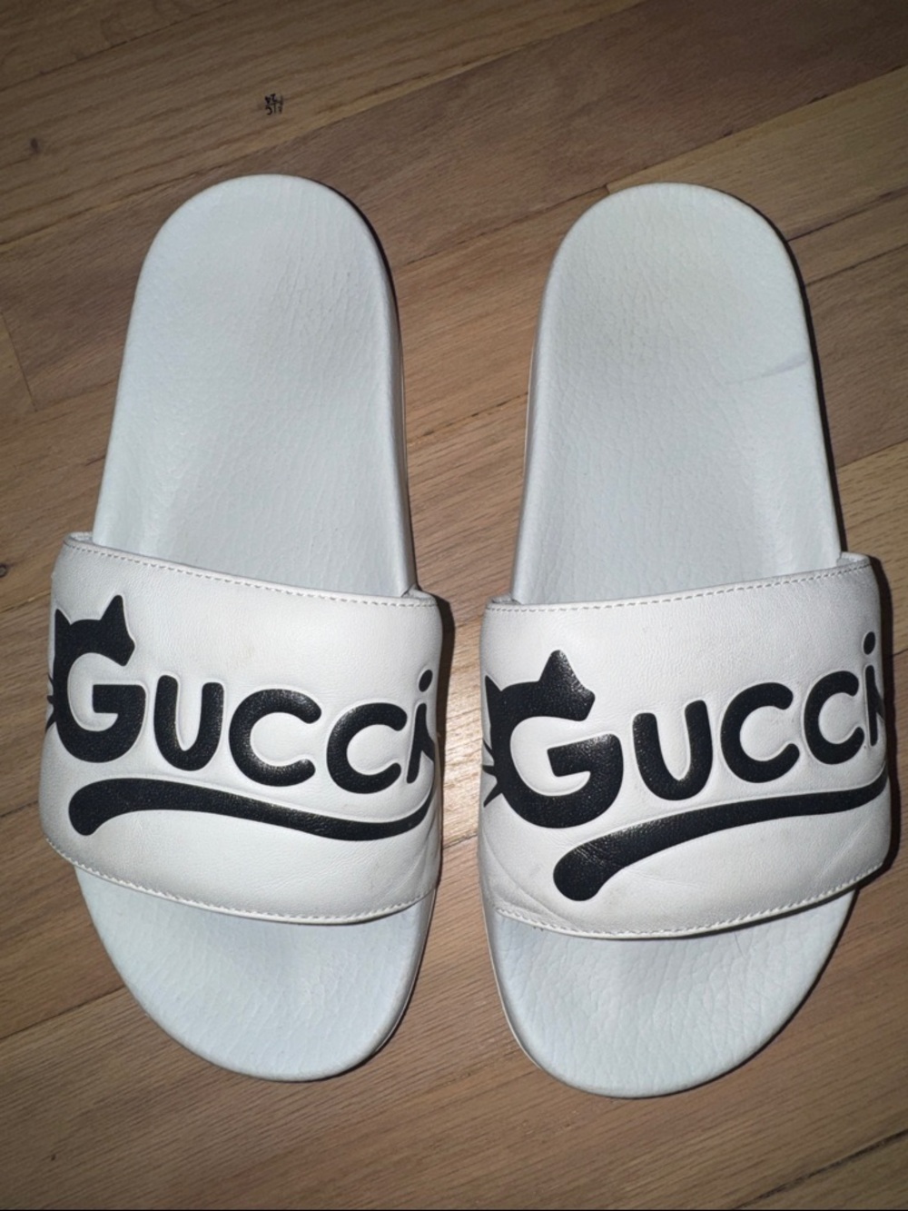 Authentic Gucci White Slides with Black Logo Script